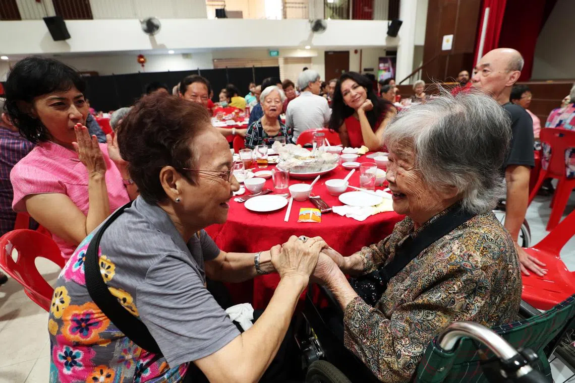 Mdm Siew Kwee Chan (left) and Soong Yee Hoi at their first meetup at the Lunar New Year reunion lunch at Henderson Community Center, on Jan 21, 2023.