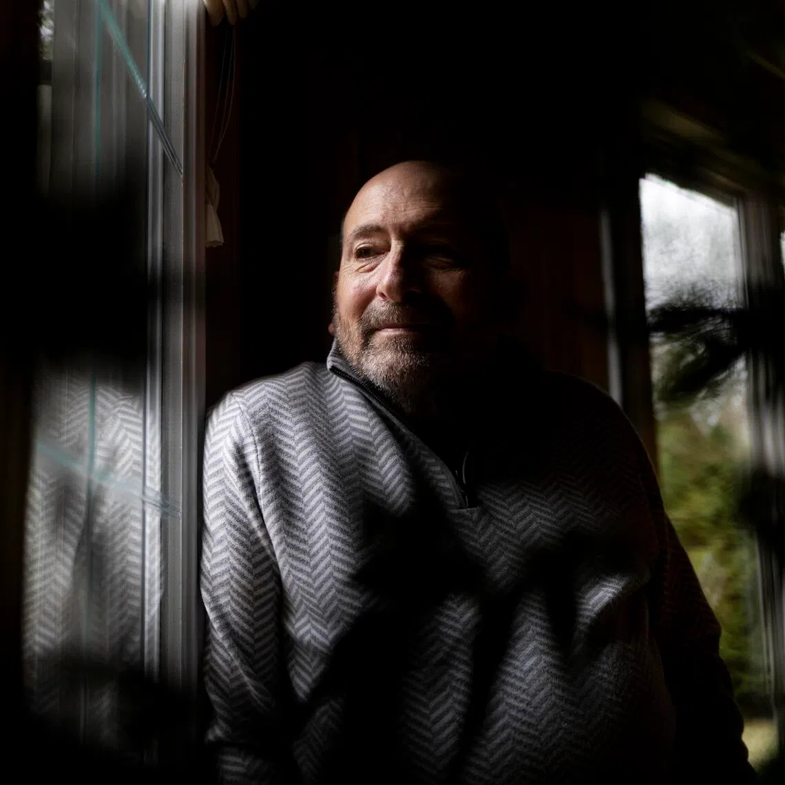 Jim Pantelas in the living room of his home in Howell, Michigan, Jan 9, 2026. 