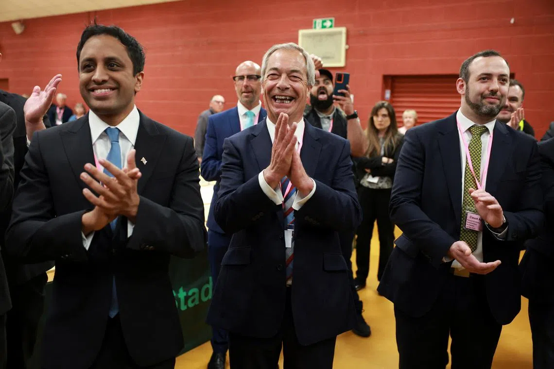 Reform party leader Nigel Farage celebrates as the party wins the Runcorn and Helsby by-election results at Halton Stadium in Widnes, Britain, May 2, 2025. REUTERS/Phil Noble