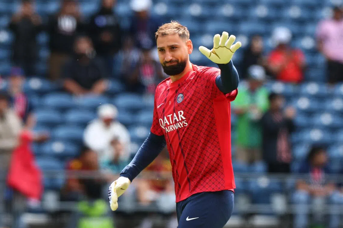 FILE PHOTO: Soccer Football - FIFA Club World Cup - Group B - Seattle Sounders v Paris St Germain - Lumen Field, Seattle, Washington, U.S. - June 23, 2025 Paris St Germain's Gianluigi Donnarumma during the warm up before the match REUTERS/Agustin Marcarian/File Photo