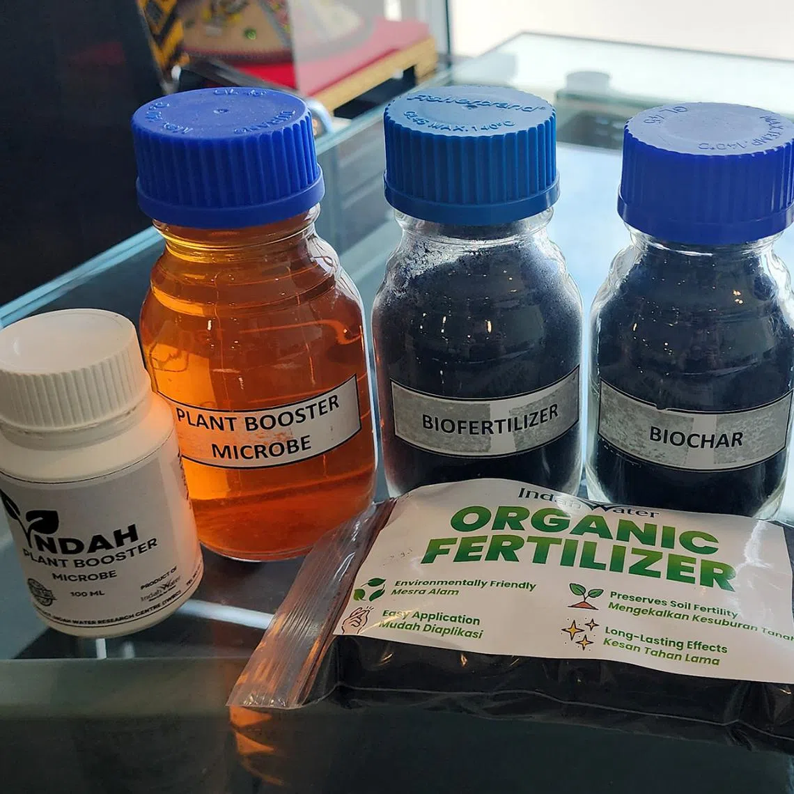 Indah Water Konsortium’s organic fertiliser made from treated biosolids, displayed with other sustainable products by the company.