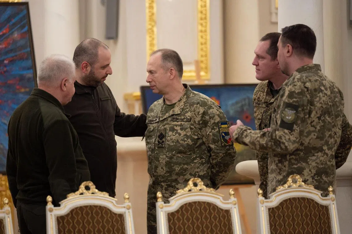 Newly appointed Commander-in-Chief of the Armed Forces of Ukraine Oleksandr Syrsky (centre), with Minister of Defence of Ukraine Rustem Umerov (second from left), during a presidential awards ceremony in Kyiv.