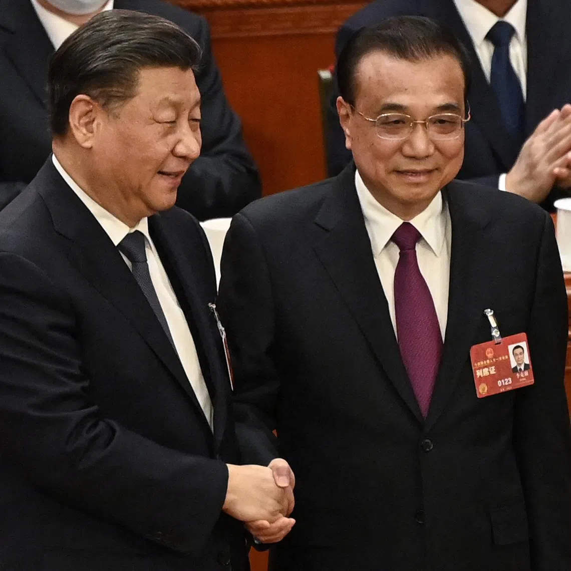 Chinese President Xi Jinping (left) with former Premier Li Keqiang during the fourth plenary session of the National People's Congress in Beijing in March.