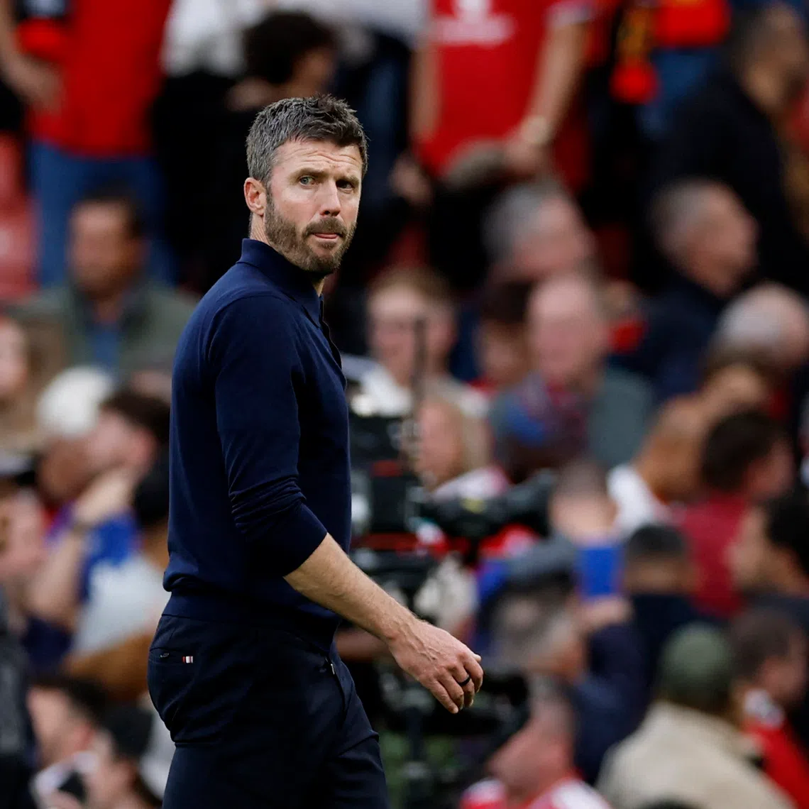 Manchester United manager Michael Carrick reacts after his side lost the match 1-0 to Manchester City at Old Trafford on Sept 13.
