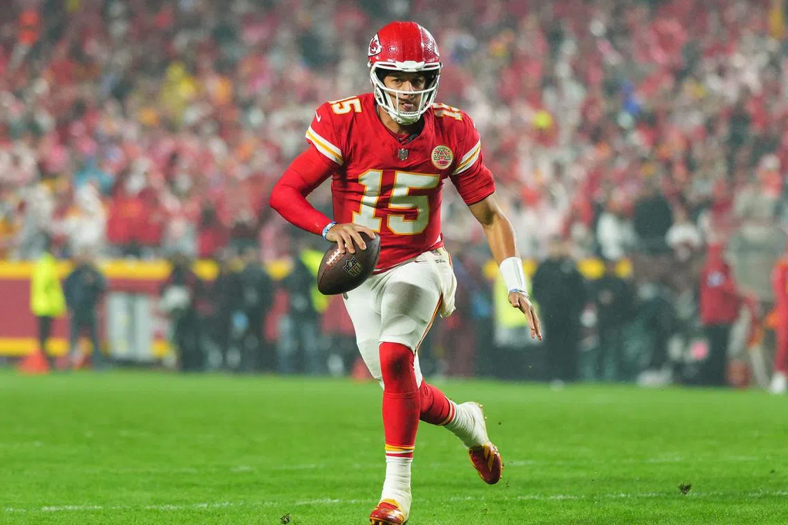 FILE PHOTO: Nov 4, 2024; Kansas City, Missouri, USA; Kansas City Chiefs quarterback Patrick Mahomes (15) rolls out to pass during the second half against the Tampa Bay Buccaneers at GEHA Field at Arrowhead Stadium. Mandatory Credit: Jay Biggerstaff-Imagn Images/File Photo