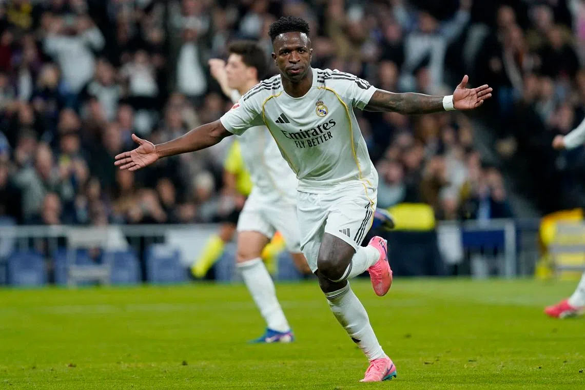 Soccer Football - LaLiga - Real Madrid v Real Sociedad - Santiago Bernabeu, Madrid, Spain - February 14, 2026 Real Madrid's Vinicius Junior celebrates scoring their second goal REUTERS/Ana Beltran