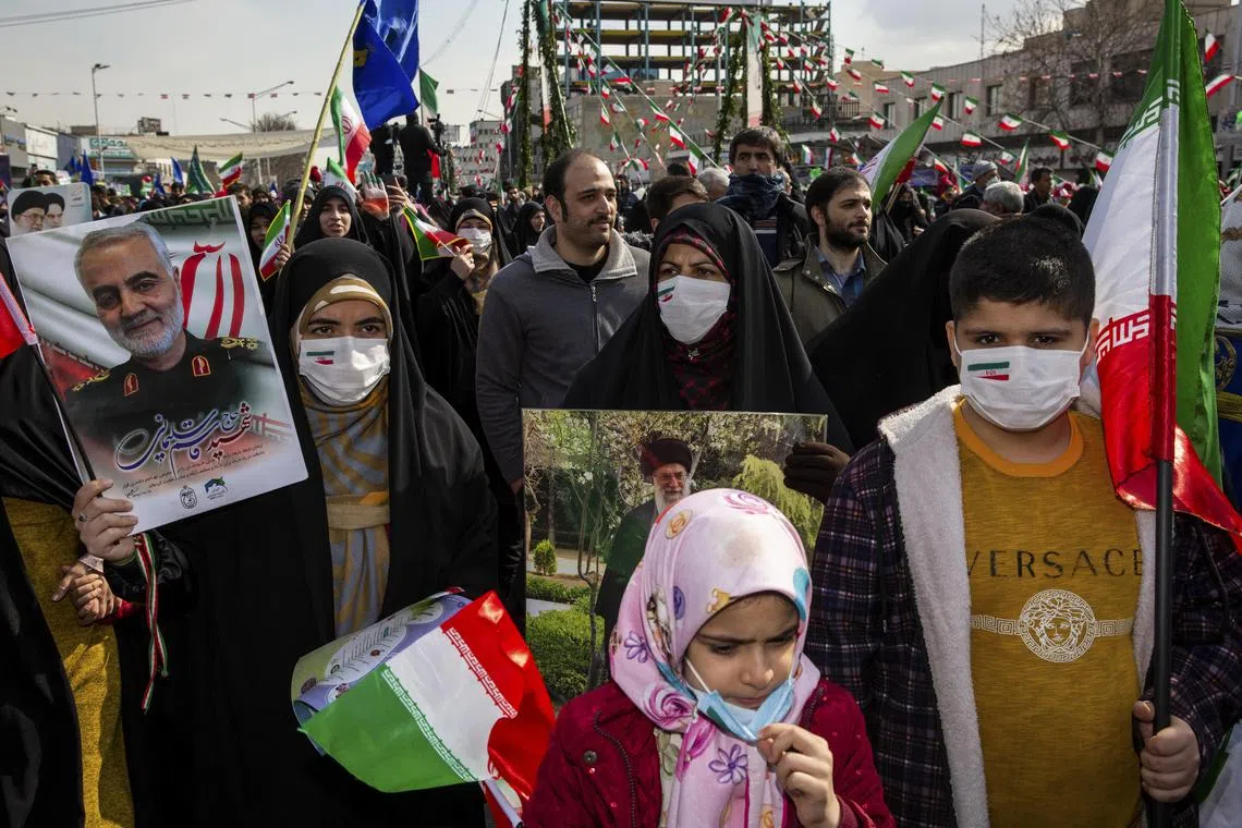 Demonstrators take part in an annual rally to commemorate the 1979 Islamic Revolution, in Tehran, Iran, on Feb 11. 