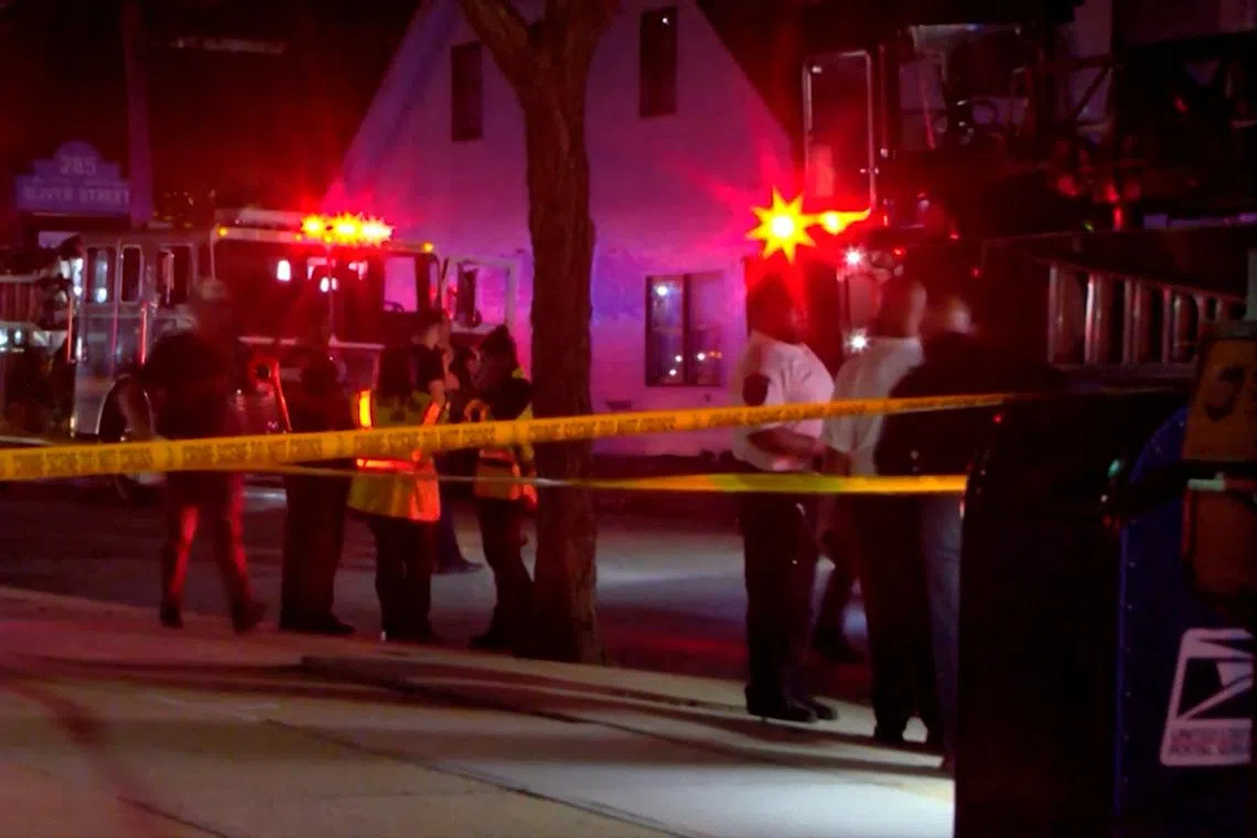 First responders stand outside Gabriel House Assisted Living Facility, after a deadly fire broke out on July 14.