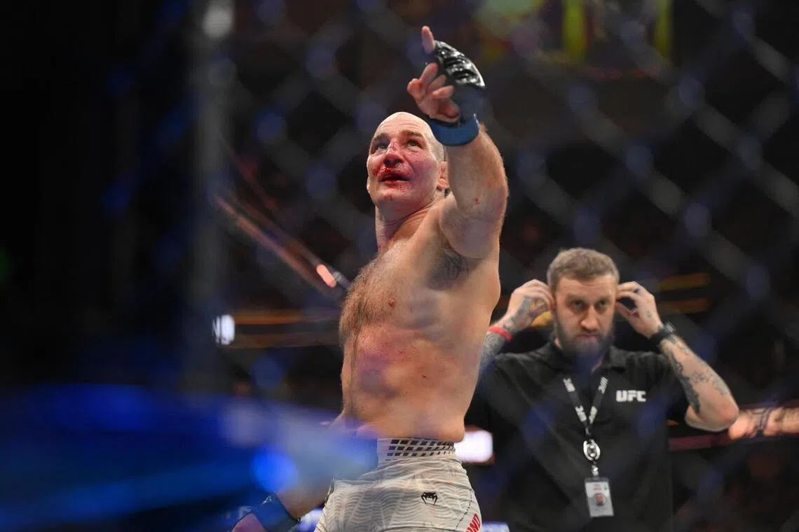 Sean Strickland celebrating after defeating Khamzat Chimaev during UFC 328 at Prudential Center in Newark, New Jersey, on May 9, 2026. He becomes a two-time UFC middleweight champion.
