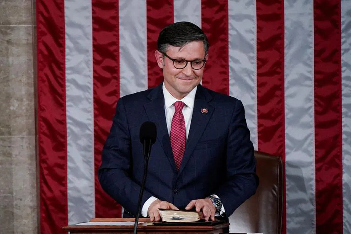 Newly elected Speaker of the House Mike Johnson (R-LA) smiles as he reacts to the applause of members of the House after being elected to be the new Speaker at the U.S. Capitol in Washington, U.S., October 25, 2023. REUTERS/Elizabeth Frantz