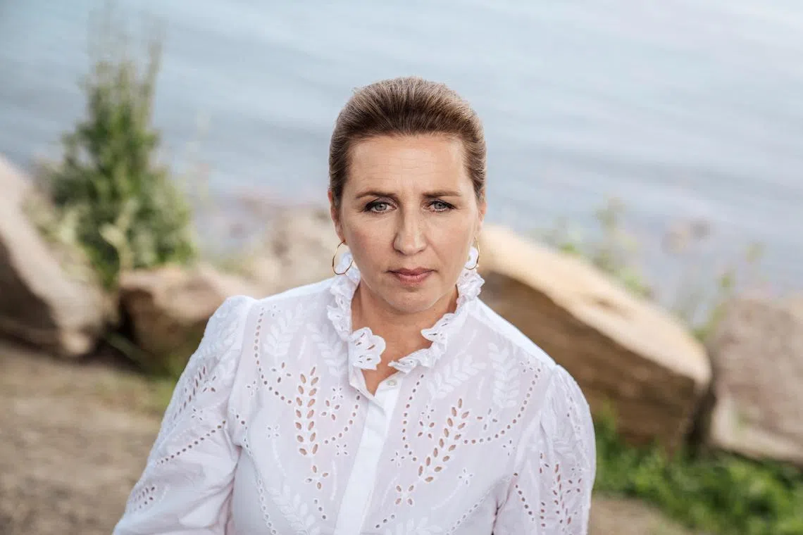 FILE PHOTO: Mette Frederiksen speaks to the media after the Social Democrats' party leader speech on the Main Stage during the People's Meeting 2024, Allinge, Bornholm, Denmark, June 14, 2024.  Ritzau Scanpix/Thomas Traasdahl via REUTERS/File Photo