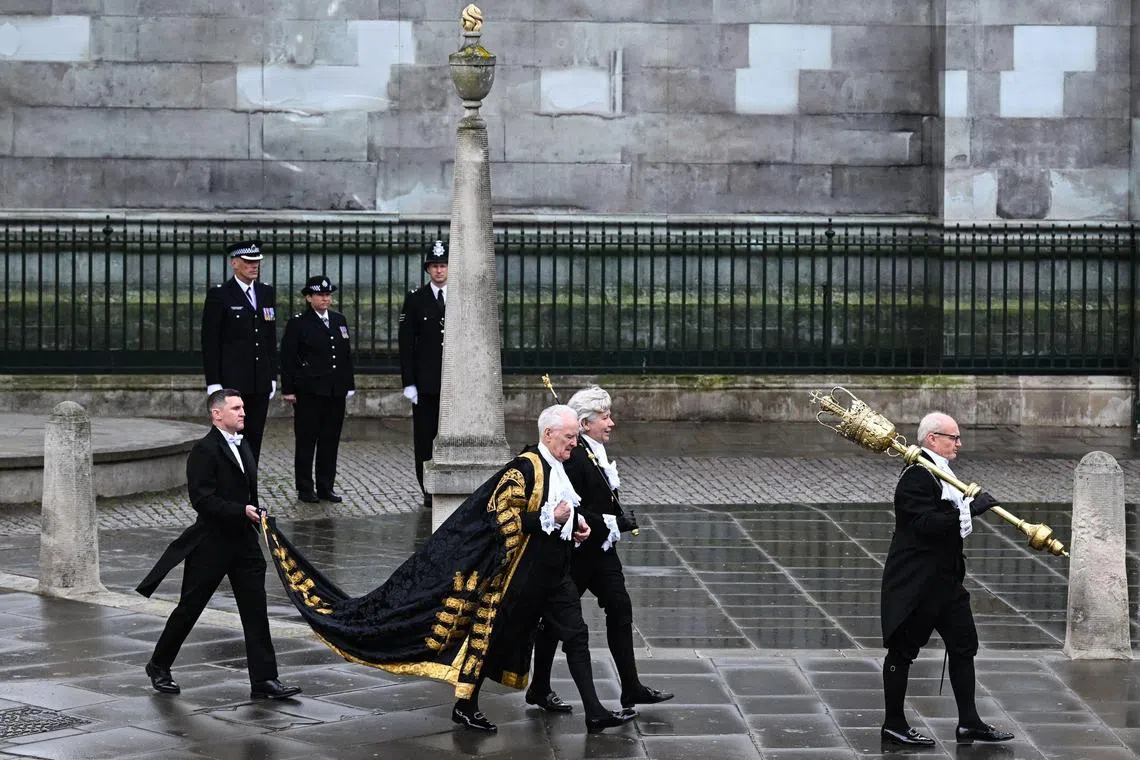 Black Rod arriving at Westminster Abbey in central London on May 6, 2023, ahead of the coronations of Britain's King Charles III and Britain's Camilla, Queen Consort. 