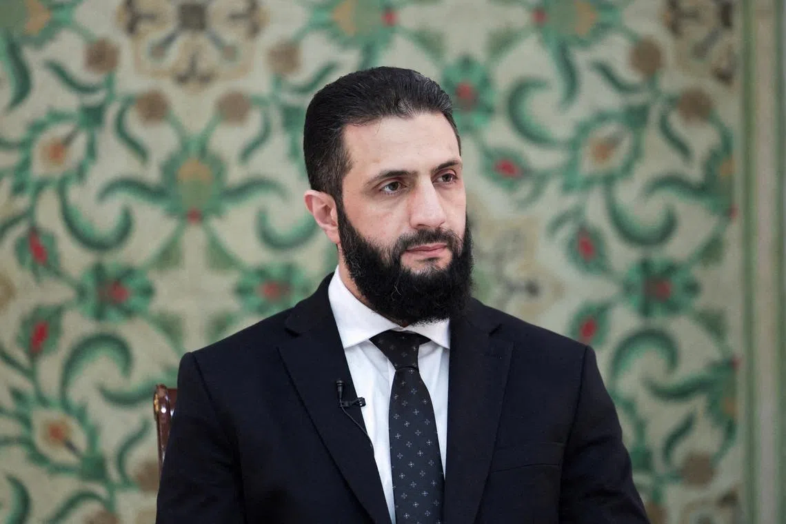 FILE PHOTO: Syria’s interim President Ahmed al-Sharaa attends an interview with Reuters at the presidential palace, in Damascus, Syria March 10, 2025. REUTERS/Khalil Ashawi/File Photo