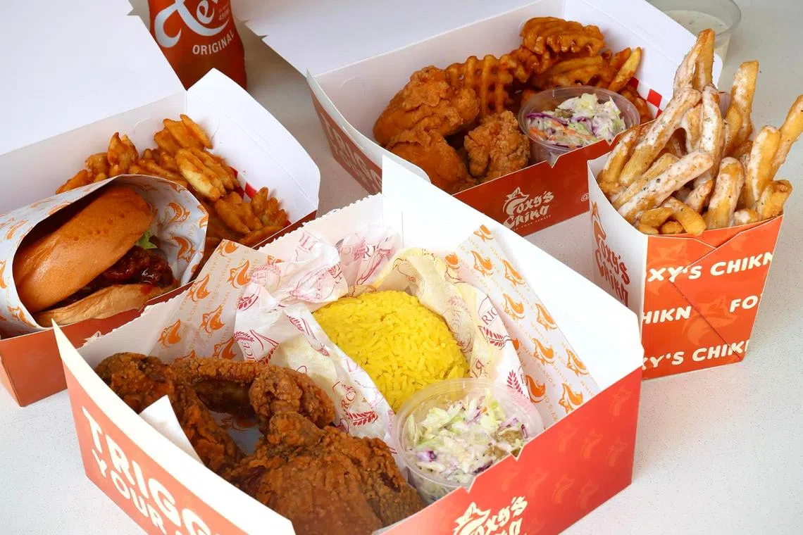 Clockwise from top left: 3 Piece Chikn Set, Tenders Set, Chikn Sandwich Set and Battered Fries at Foxy’s Chikn.