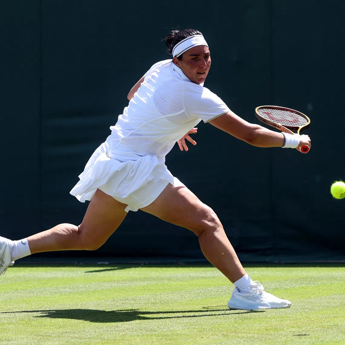 Tennis - Wimbledon - All England Lawn Tennis and Croquet Club, London, Britain - June 30, 2025 Tunisia's Ons Jabeur in action during her first round match against Bulgaria's Viktoriya Tomova REUTERS/Toby Melville