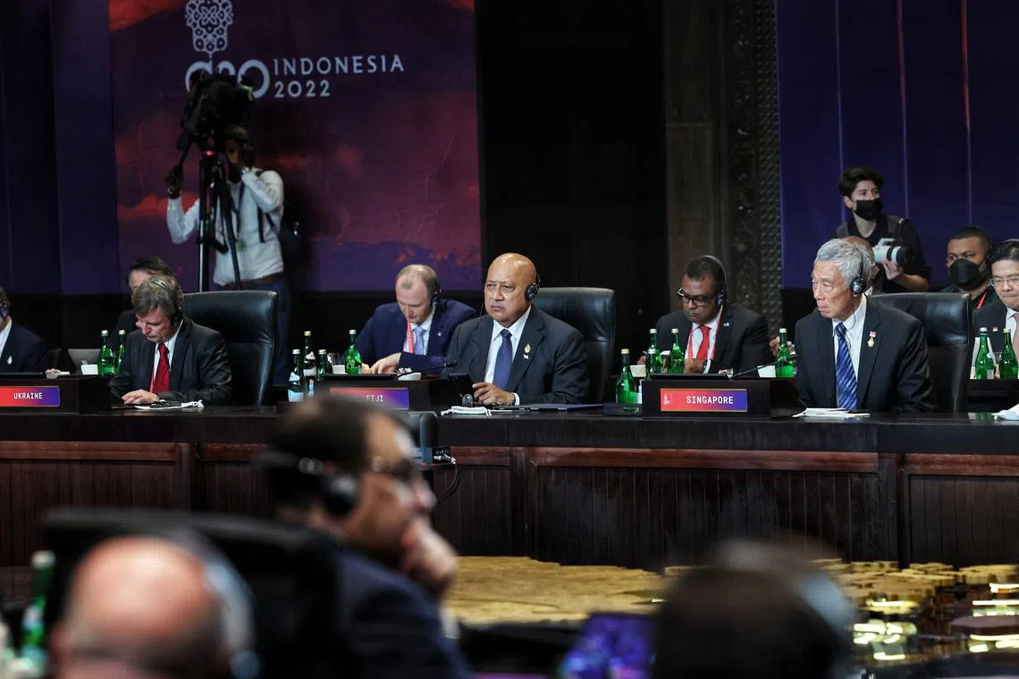 Prime Minister Lee Hsien Loong participating in the first working session of the G-20 Leaders' Summit in Bali. 