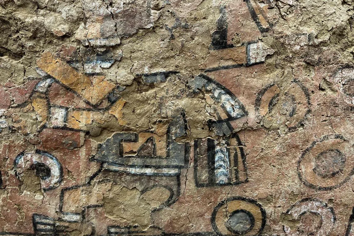 An undated picture shows the detail in a pre-Hispanic wall painting with mythological scenes uncovered near the Lambayeque town of Illimo in northern Peru, after decades it was considered lost by archaeologists. - A team of archaeologists led by Swiss Sam Ghavanmi found a 1,000-year-old mural, known as the "Huaca Pintada", which had been lost in 1916 after tomb raiders and treasure hunters discovered it.