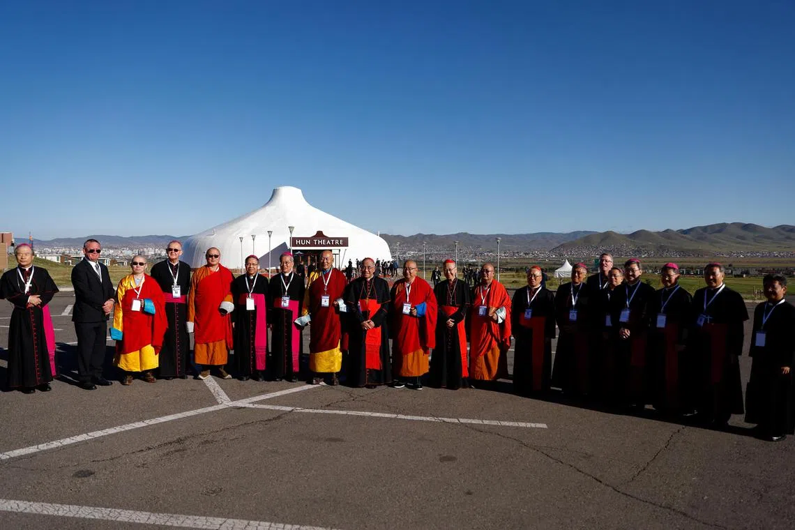 Attendees arrive ahead of an ecumenical and interreligious meeting at the Hun Theatre, during Pope Francis' Apostolic Journey in Ulaanbaatar, Mongolia on Sunday. 