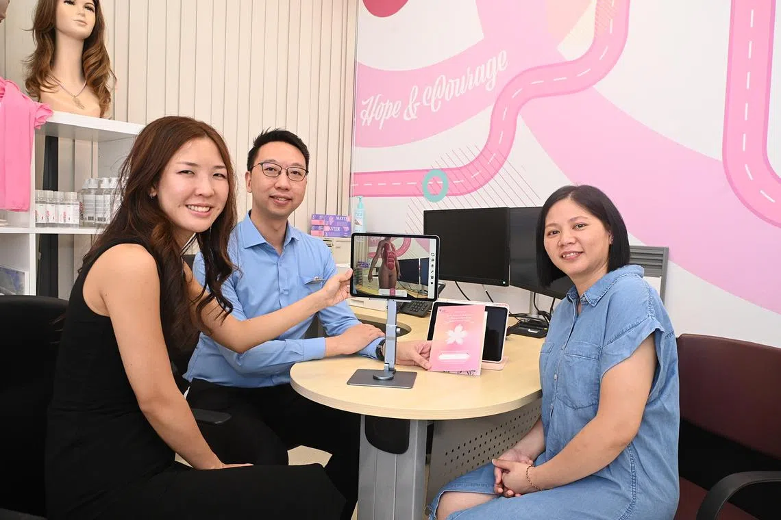(From left) Dr Jolie Hwee, Head of KTPH's plastic, reconstructive & aesthetics surgery, Dr Clement Chia, head of KTPH's breast surgery department with patient Jane Din.