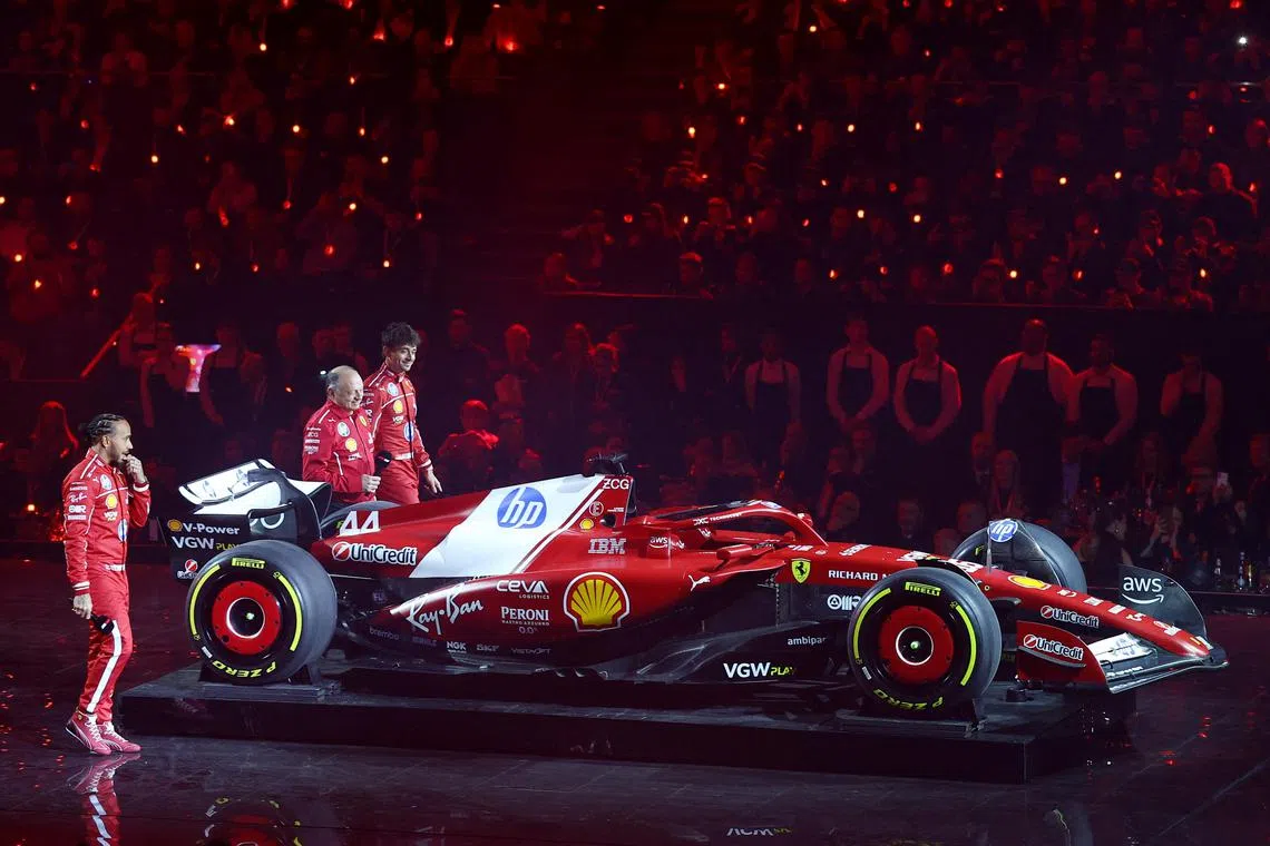 Ferrari team principal Frederic Vasseur with drivers Lewis Hamilton (left) and Charles Leclerc during a 10-team car reveal event in London on Feb 18.