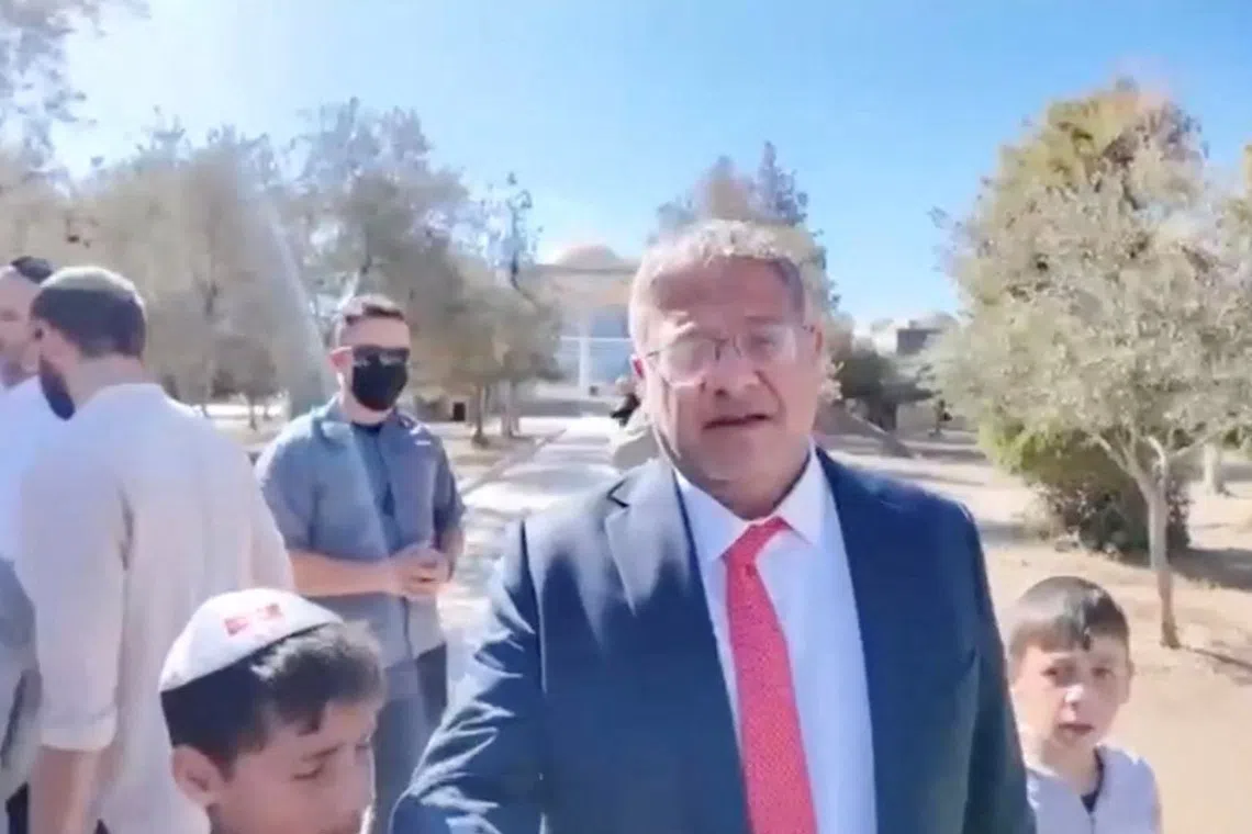 Israeli National Security Minister Itamar Ben-Gvir visits the Al-Aqsa Mosque compound during the Jewish holiday of Sukkot, in the Old City of Jerusalem, in this screengrab from a video obtained by Reuters on October 8, 2025. Jewish Power/Handout via REUTERS