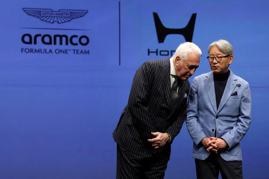 Aston Martin Formula One team owner Lawrence Stroll talking with Honda CEO Toshihiro Mibe during their joint-press conference on their partnership launch announcement in Tokyo on Jan 20, 2026.