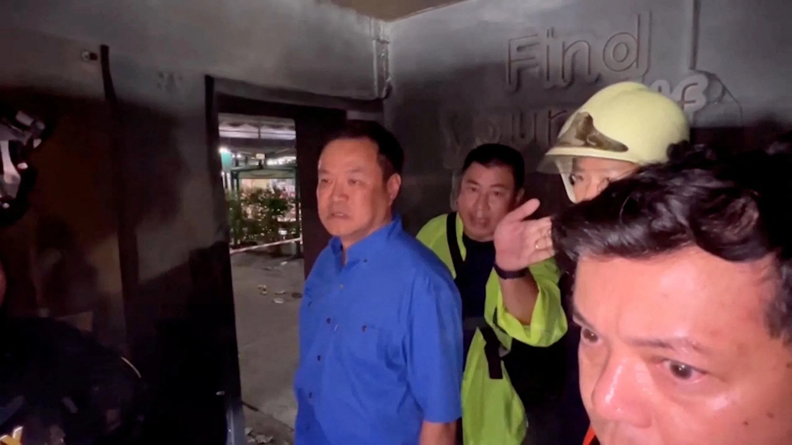 Thai Prime Minister Anutin Charnvirakul visiting the site of the deadly pub fire in Bangkok on July 13.