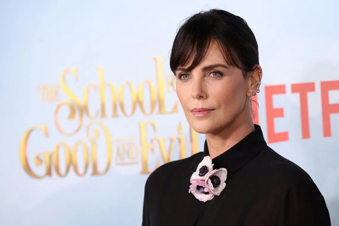 Cast member Charlize Theron attends a premiere for the film "The School for Good and Evil" in Los Angeles, California, U.S. October 18, 2022. REUTERS/Mario Anzuoni