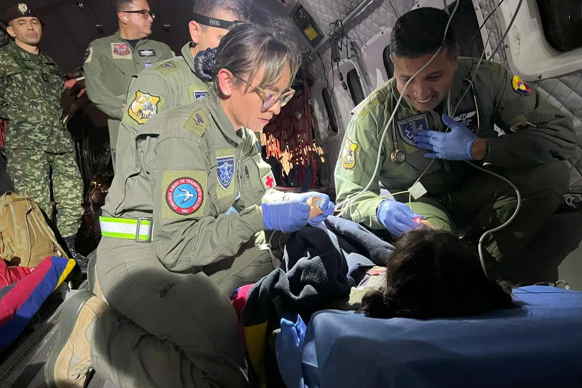 The Colombian Army checking one of the four children who were found alive after being lost for 40 days in the Amazon, on June 9.
