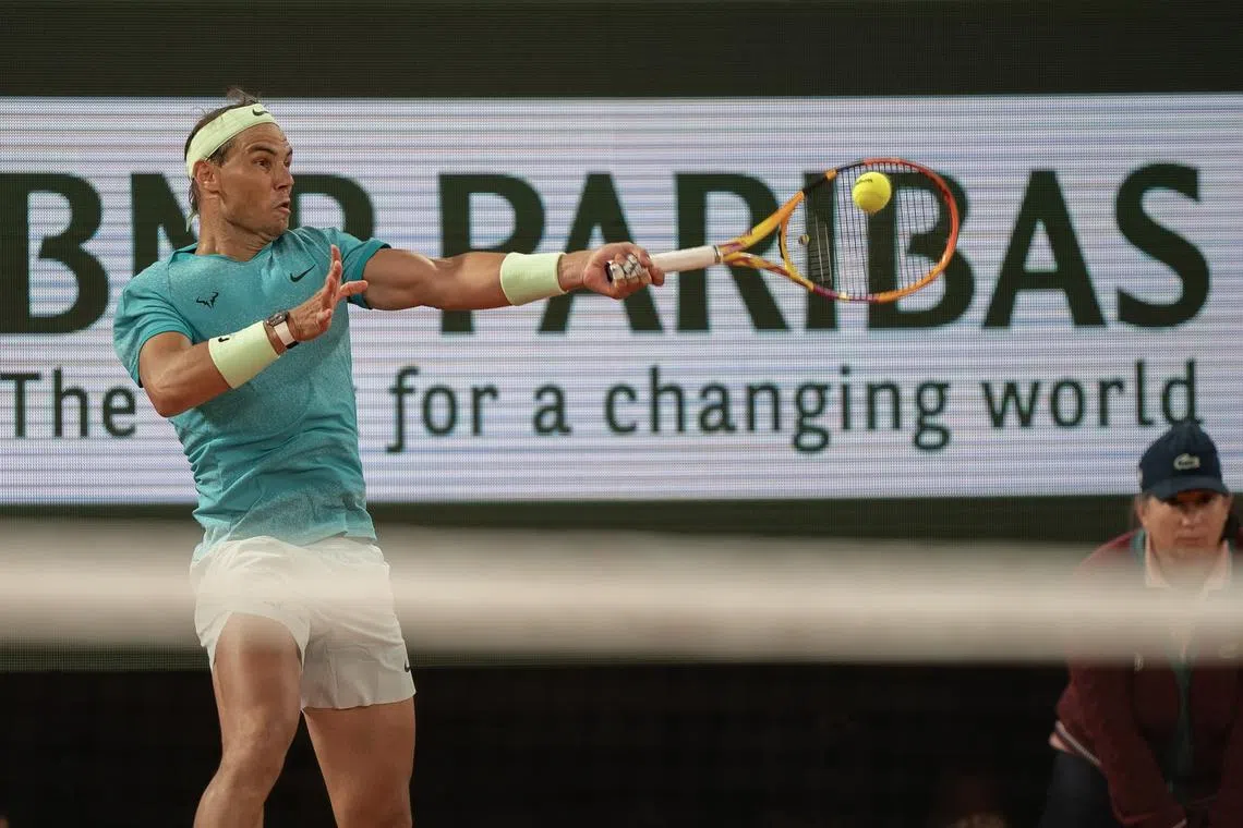 May 27, 2024; Paris, France; Rafael Nadal of Spain returns a shot during his match against Alexander Zverev of Germany on day two of Roland Garros at Stade Roland Garros. Mandatory Credit: Susan Mullane-USA TODAY Sports