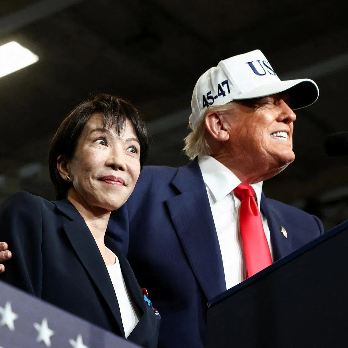 Japanese Prime Minister Sanae Takaichi and US President Donald Trump aboard the aircraft carrier USS George Washington on Oct 28, 2025. 
