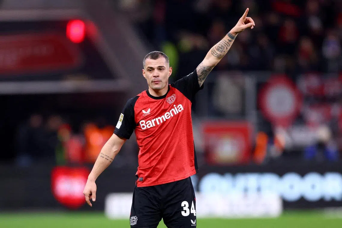 FILE PHOTO: Soccer Football - Bundesliga - Bayer Leverkusen v Bayern Munich - BayArena, Leverkusen, Germany - February 15, 2025 Bayer Leverkusen's Granit Xhaka reacts REUTERS/Thilo Schmuelgen /File Photo