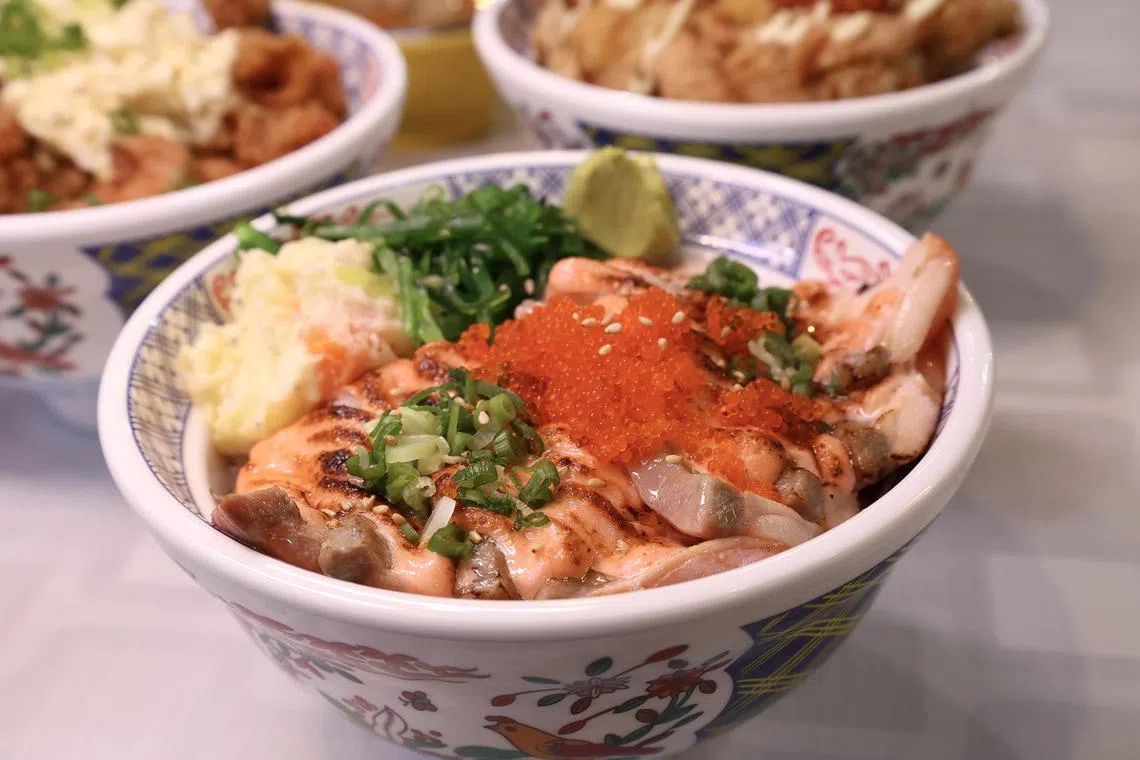 (front to back, clockwise) Salmon Mentai Don, Kimchi Karaage Don and Tori Nanban Don at Ten Ten Otoko’s newest outlet at Lucky Plaza.