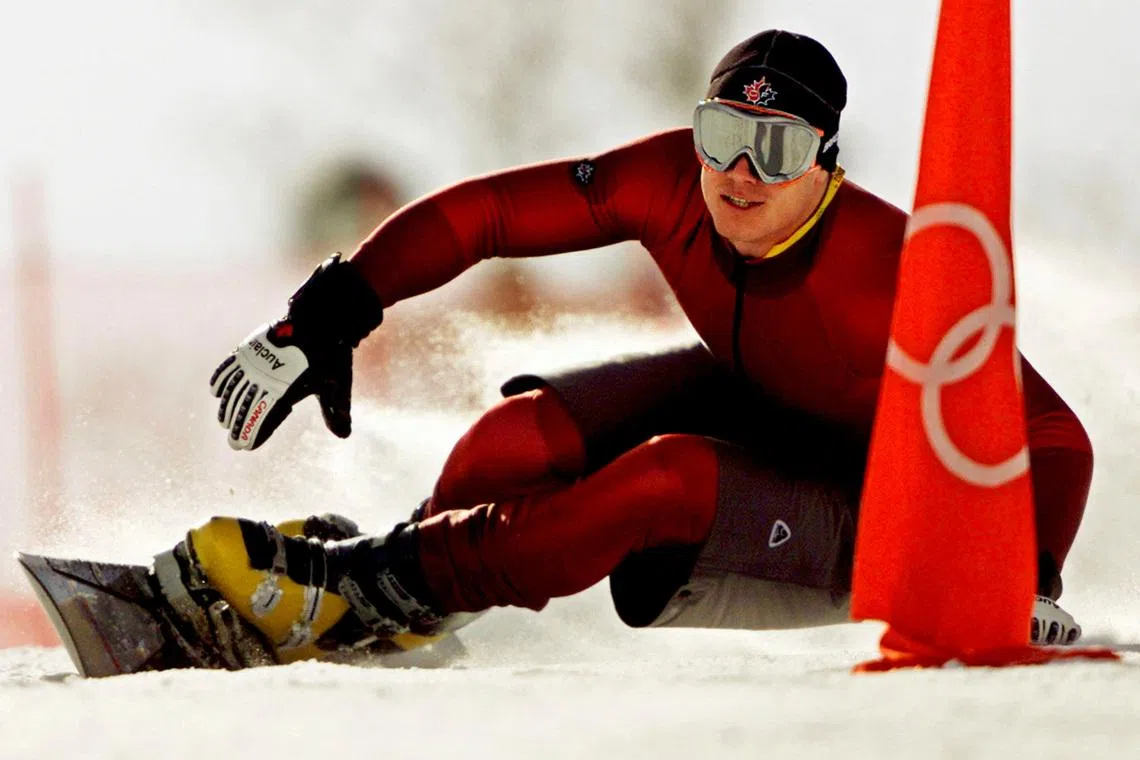 FILE PHOTO: Ryan Wedding of Canada takes a practice run for the men's parallel giant slalom of the Salt Lake 2002 Winter Olympic Games in Park City, February 13, 2002. Competition in the men's parallel giant slalom begins February 14, 2002. REUTERS/Jeff J Mitchell/File Photo