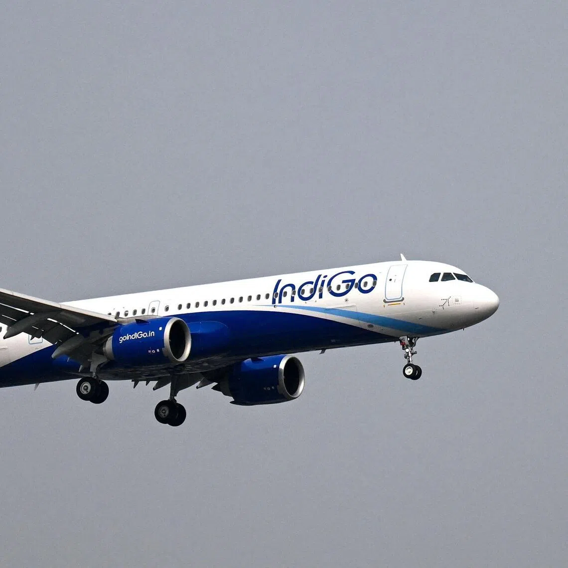 An IndiGo Airways aircraft prepares to land at the Mumbai airport on Dec 6, 2025. PHOTO: AFP