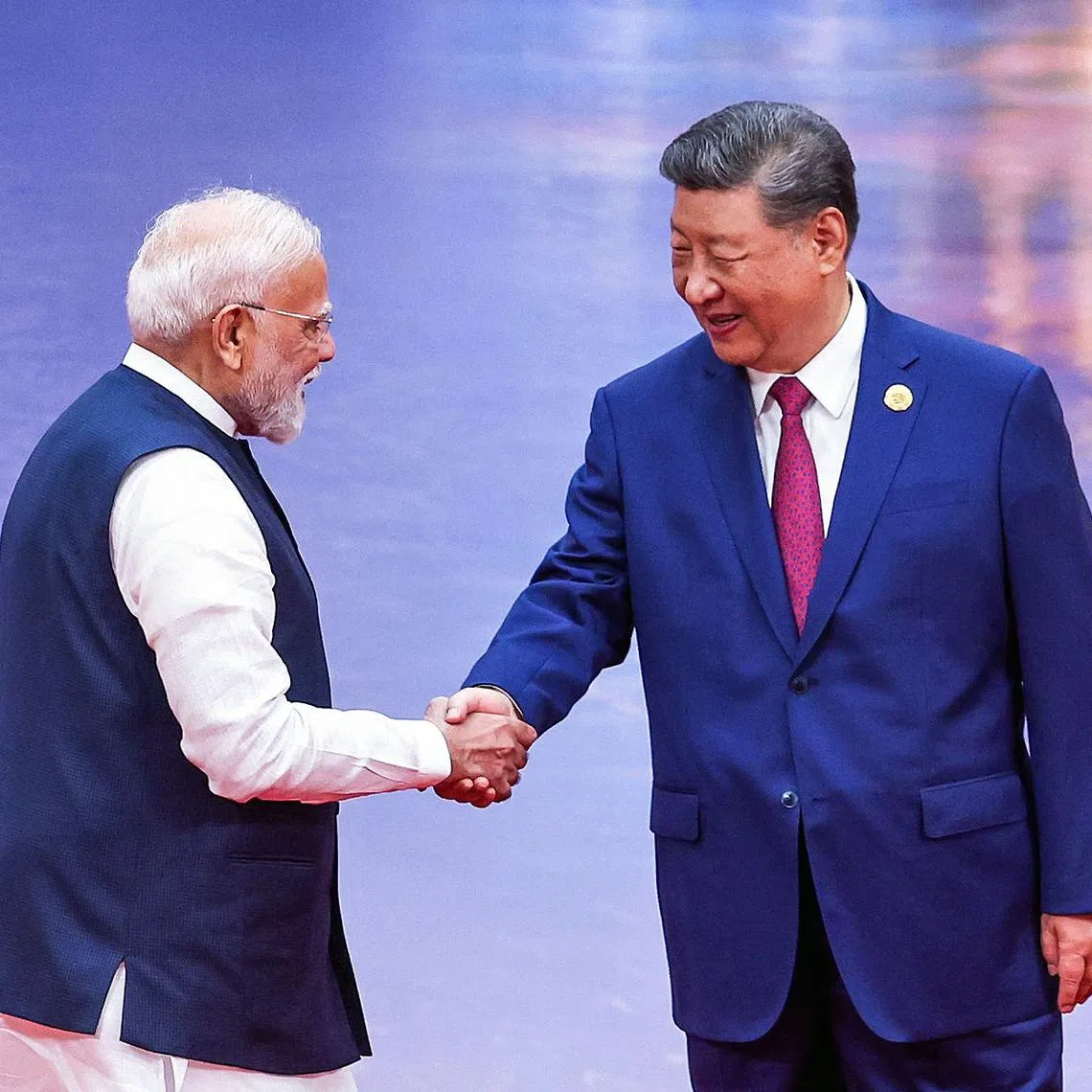 Indian Prime Minister Narendra Modi and Chinese President Xi Jinping at the Shanghai Cooperation Organisation summit in Tianjin on Aug 31.
