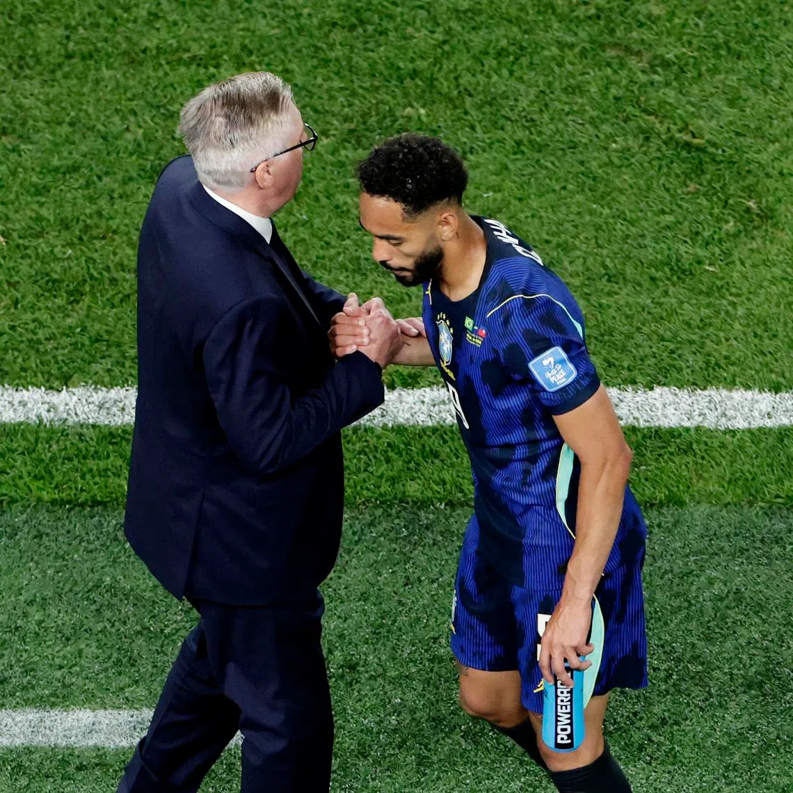 Soccer Football - FIFA World Cup 2026 - Group C - Brazil v Haiti - Philadelphia Stadium, Philadelphia, Pennsylvania, U.S. - June 19, 2026 Brazil coach Carlo Ancelotti shakes hands with Matheus Cunha after he was substituted REUTERS/Jeenah Moon