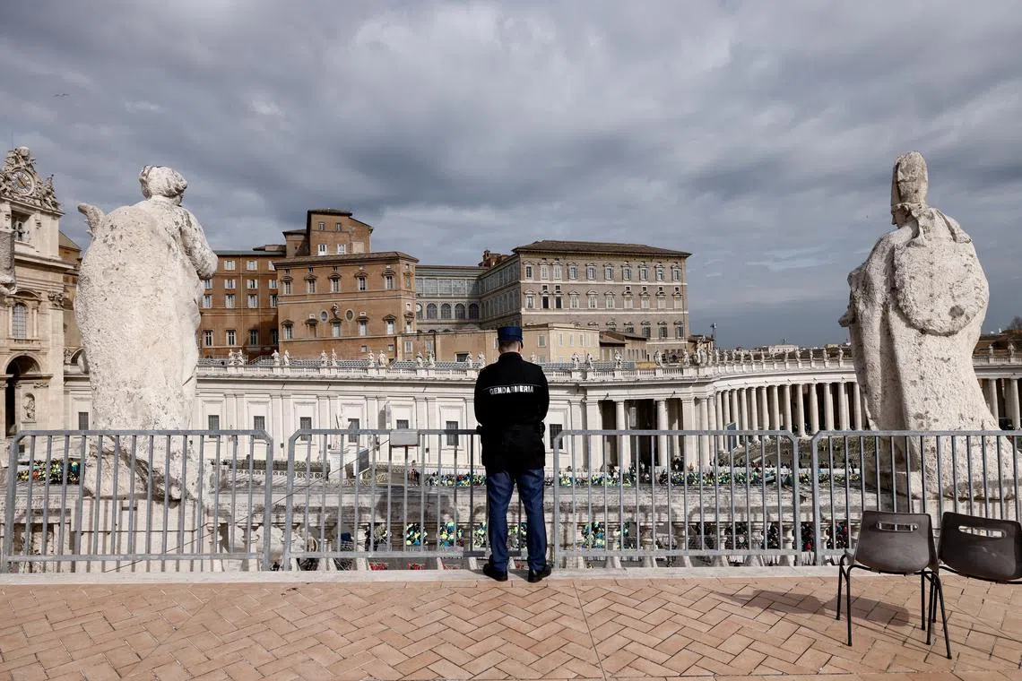 FILE PHOTO: A gendarme stands over Saint Peter's Square on the day of a Mass for the Jubilee of Volunteers, as Pope Francis continues hospitalisation, at the Vatican, March 9, 2025. REUTERS/Matteo Minnella/File Photo
