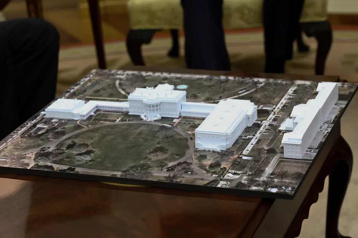 A model of the new White House ballroom on display in the Oval Office of the White House on Oct 22.