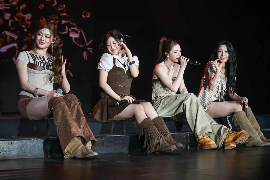 Four of K-pop group Fifty Fifty’s members (from left) Athena, Yewon, Chanelle Moon and Keena performing at the Mediacorp Cloud 9 event at the Arena @ Expo in May 2026.