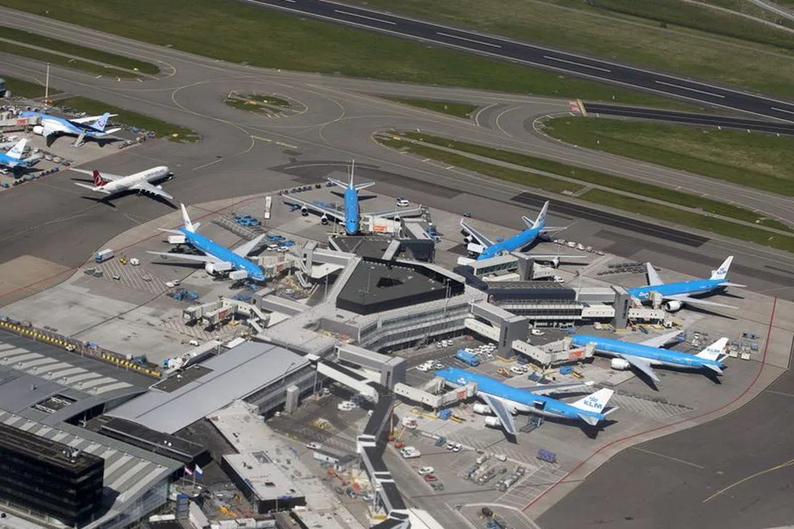 FILE PHOTO: KLM aircraft are seen on the tarmac at Schipol airport near Amsterdam April 15, 2015. REUTERS/Yves Herman/File Photo