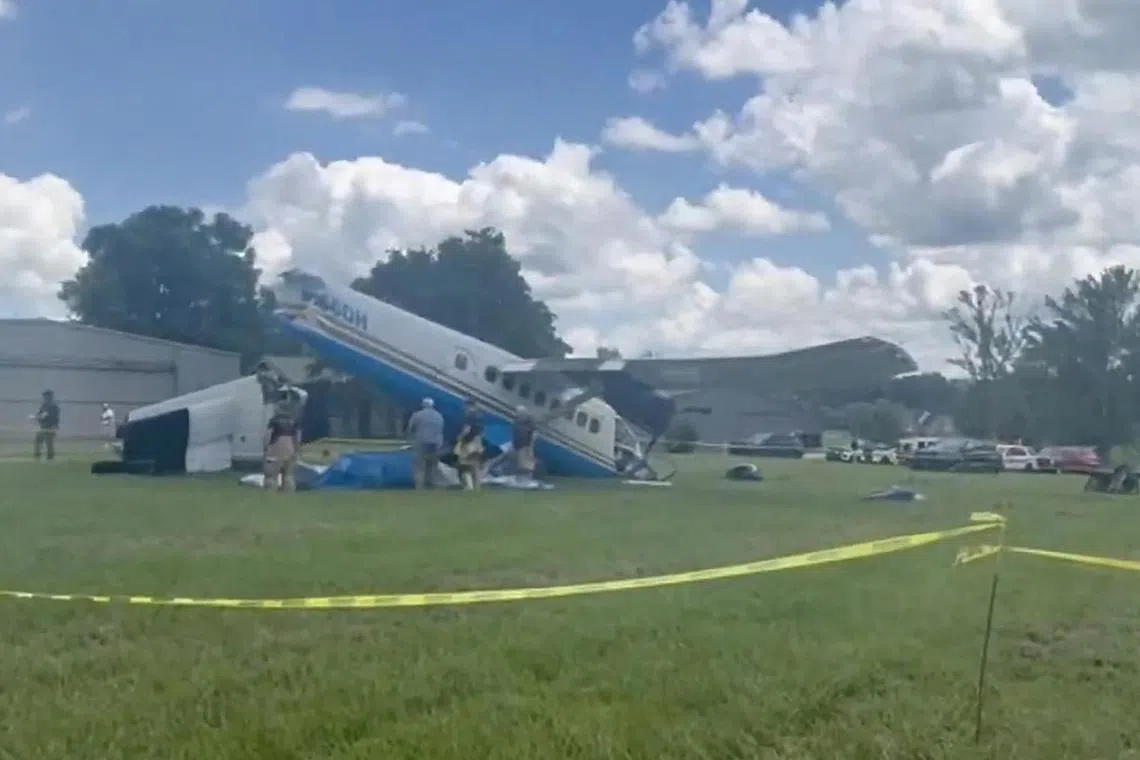 State troopers and police cars at the scene of a plane crash on Old Shelbyville Road in Tullahoma, Tennessee on June 8, 2025. 