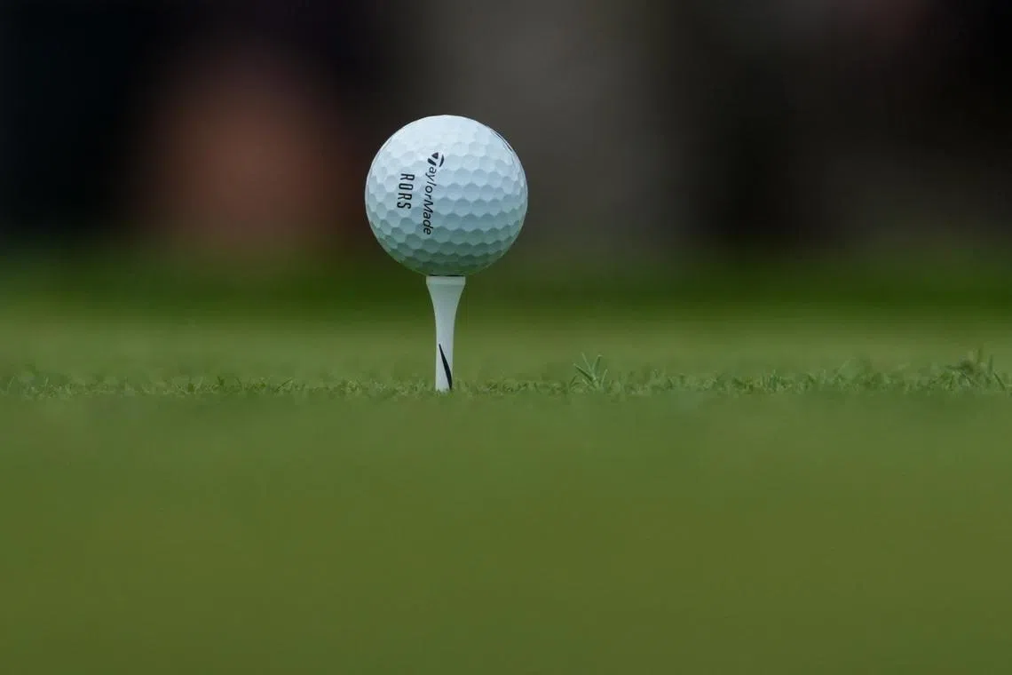 Jun 5, 2026; Dublin, Ohio, USA; The TaylorMade golf ball of Rory McIlroy sits on the first tee during the second round of the Memorial Tournament presented by Workday golf tournament. Mandatory Credit: Aaron Doster-Imagn Images