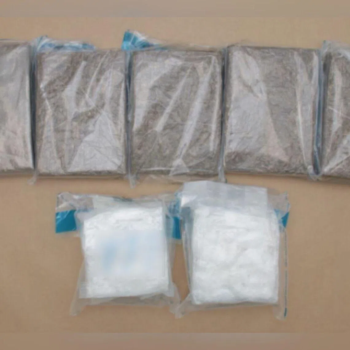 A total of about 5,127g of cannabis and 2,072g of methamphetamine, which have an estimated worth of more than $547,000, were seized.