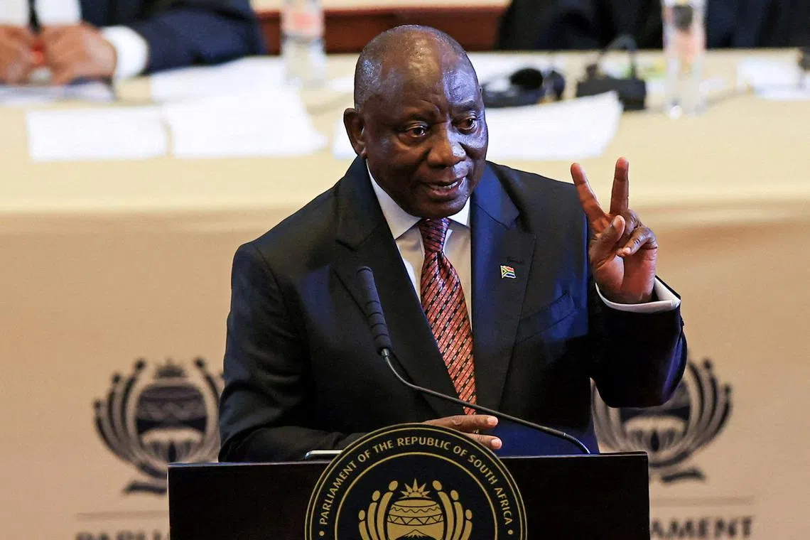 FILE PHOTO: South African President Cyril Ramaphosa gestures as he delivers his 2025 State of the Nation Address in Cape Town, South Africa, February 6, 2025. REUTERS/Esa Alexander/File Photo