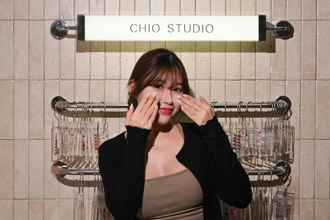 Stacey Law owns nail salon Chio Studio offering BigBang-themed nail art.