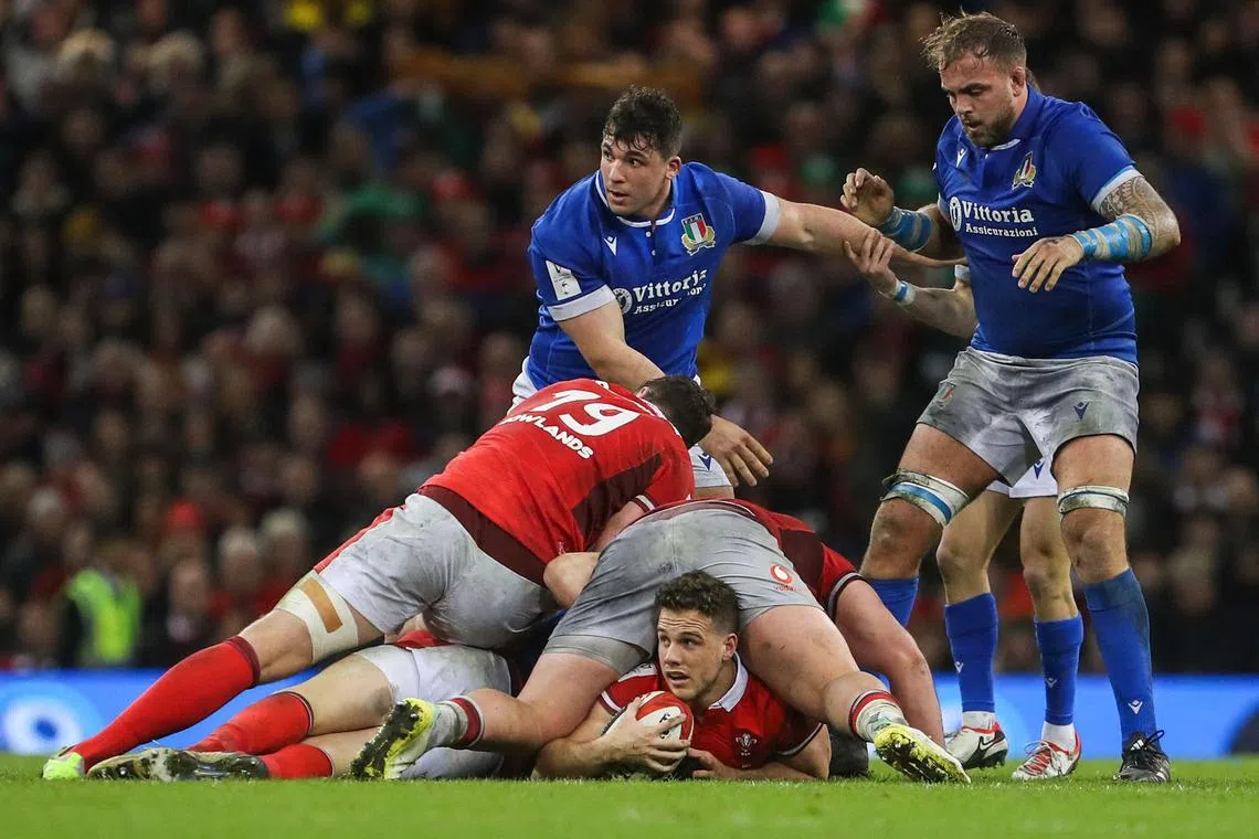 Wales' scrum-half Keiran Hardy has possession in the Six Nations rugby union match against Italy at the Principality Stadium in Cardiff on March 16, 2024.