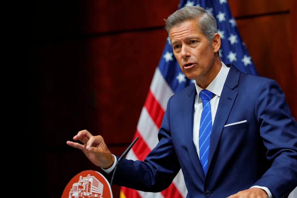 FILE PHOTO: U.S. Transportation Secretary Sean Duffy speaks during a press conference at the U.S. Department of Transportation in Washington, D.C., U.S., August 26, 2025. REUTERS/Brian Snyder/ File Photo