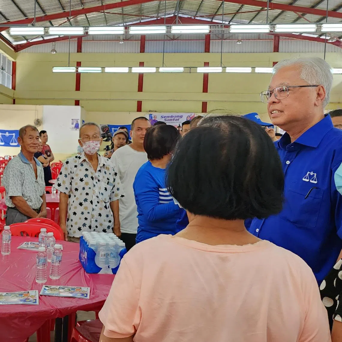 Malaysia's caretaker PM Ismail Sabri Yaakob meets voters in Mengkarang on Nov 16, 2022.
