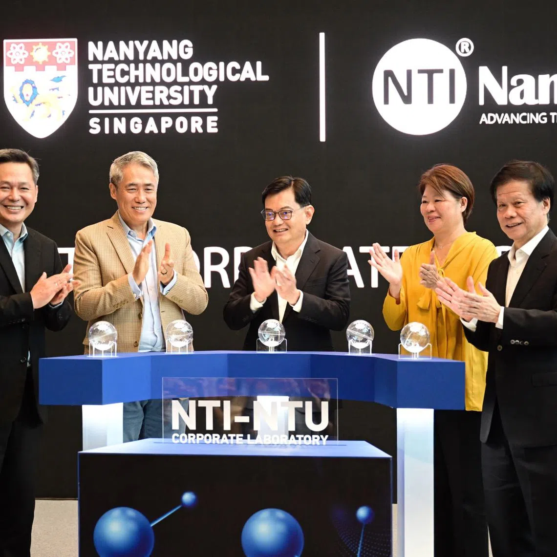 (From left) Nanofilm group chief executive Gary Ho, Nanofilm founder and executive chairman Shi Xu, DPM Heng Swee Keat, NTU board chair Goh Swee Chen and  NTU vice-president (Industry) Lam Khin Yong, at the official launch on Nov 28.